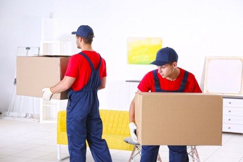 Office relocation planning in Tooting with moving boxes and workstations