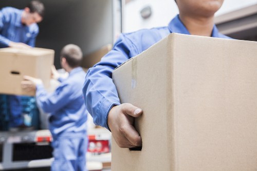 Customer storing packed items in a secure self-storage unit