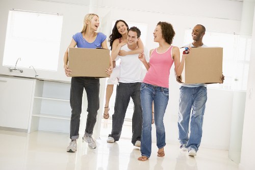 Packed boxes and furniture prepared for storage in Tooting