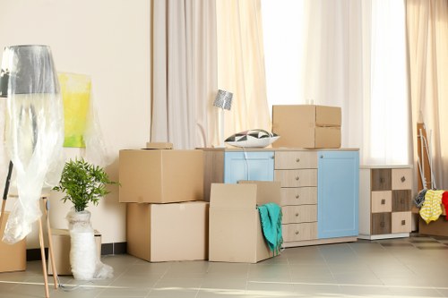 Professional movers handling removals in Tooting on a residential street