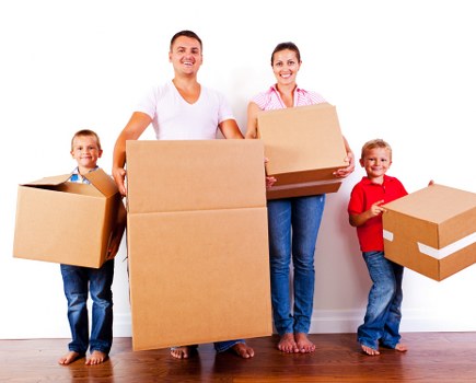 Packing boxes and furniture for a house move in Tooting