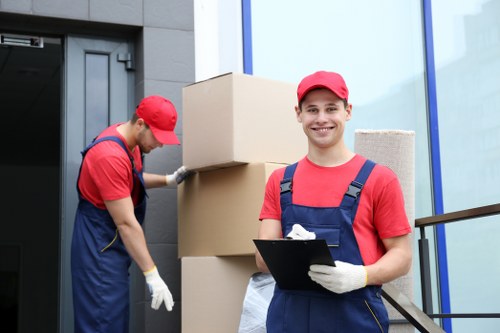 Staff maintaining safe access and housekeeping at a storage facility