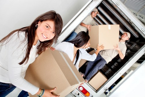 Carefully wrapped household items prepared for house removals in Tooting